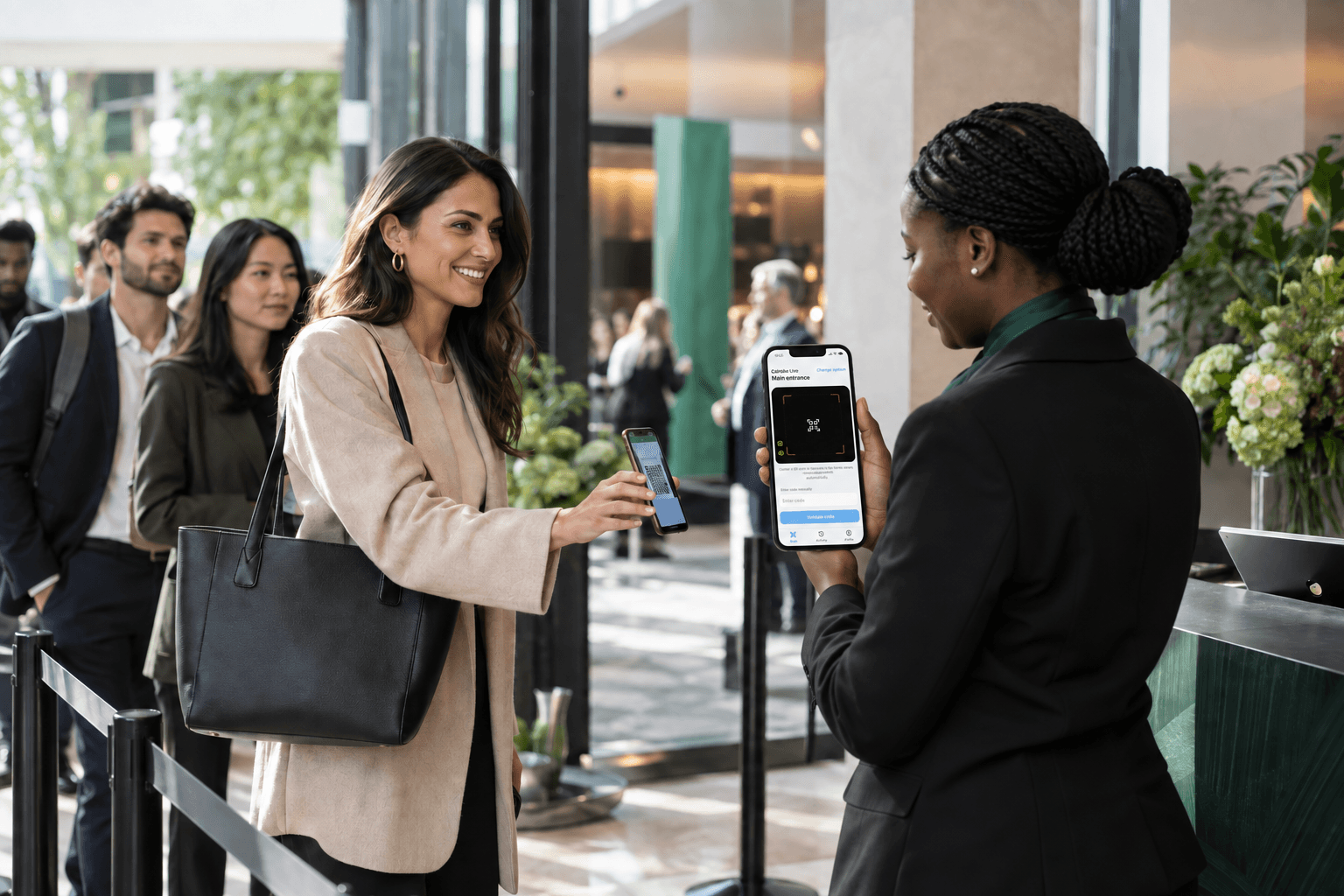 Event staff validating a guest's digital ticket at a venue entrance